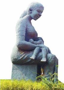A mother breast-feeding her baby by sculptor Aryanad Rajendran conveys the message of love.