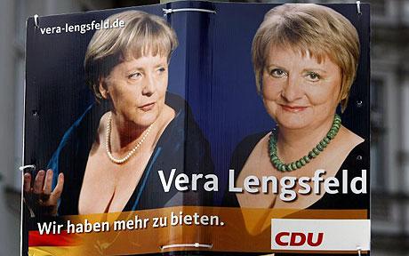 An election campaign poster for the 2009 general election with the words ' We have more to offer' shows German Chancellor Angela Merkel (R) and Vera Lengsfeld (Photo - REUTERS)