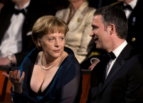 Don't look down: Angela Merkel with Mr Stoltenberg last night (Source: dailymail.co.uk)